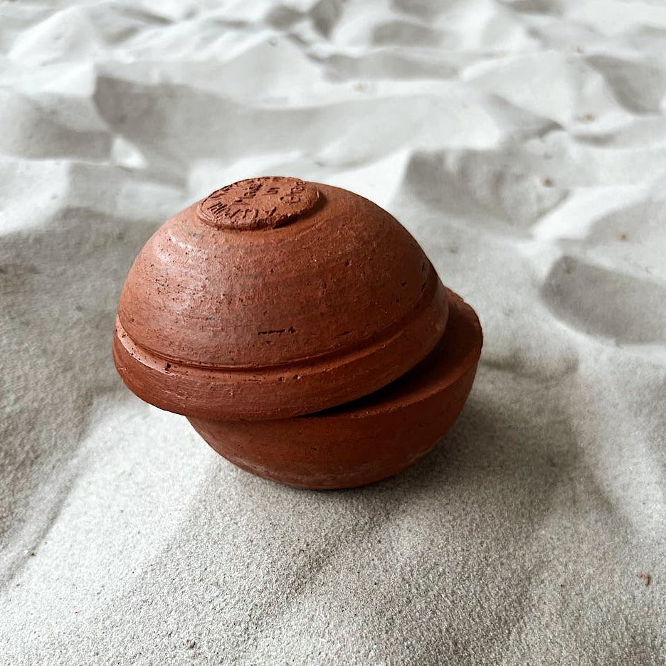 Shea butter in a ceramic bowl